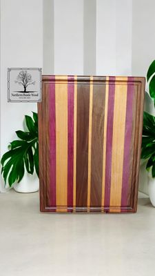Handmade maple, black walnut and purpleheart cutting board by northern rustic wood