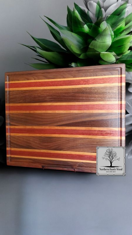 cutting board made from black walnut, maple and padauk handmade by Northern Rustic Wood