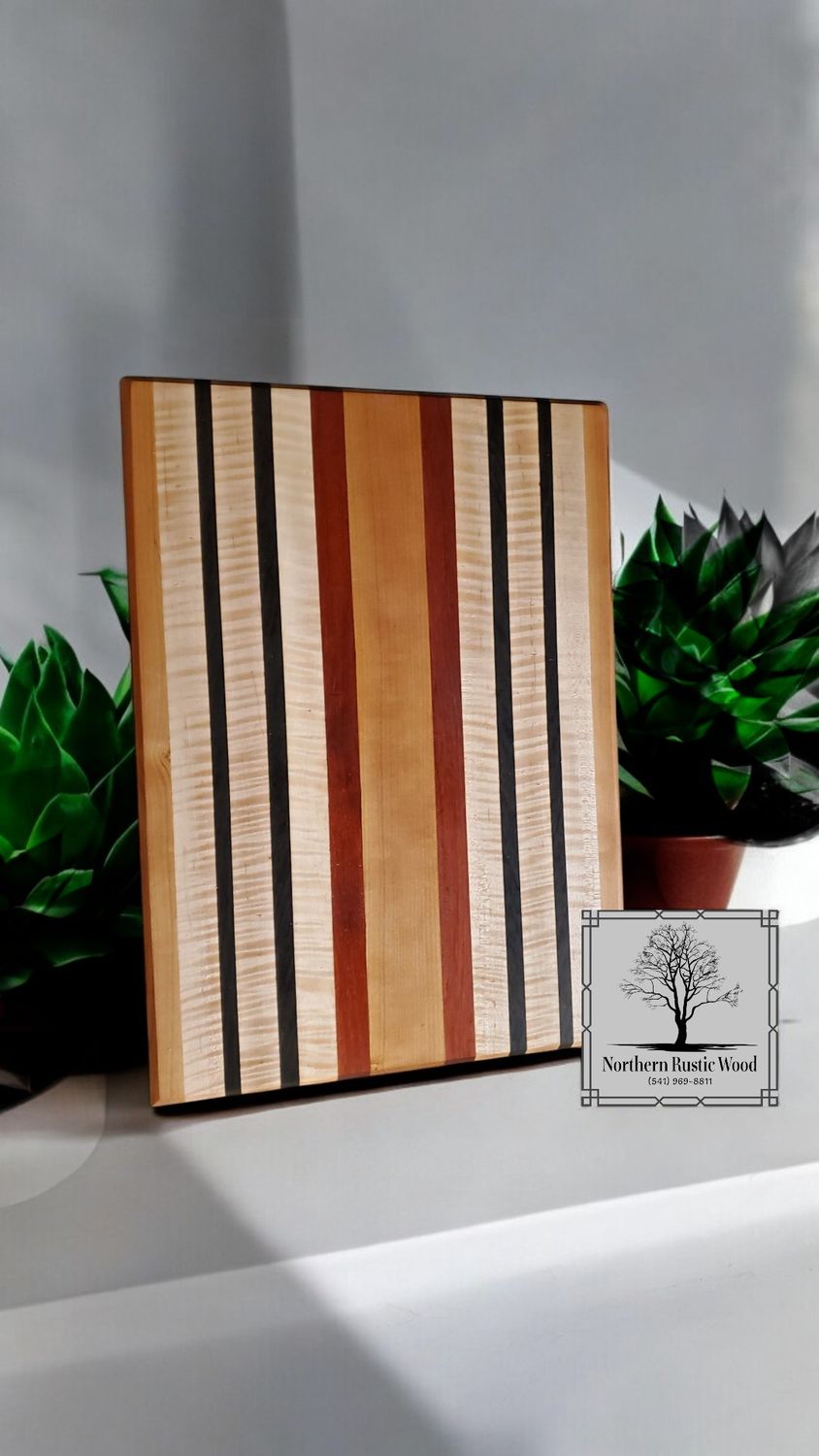 Handmade ribbon maple, padauk and wenge cutting board by Northern Rustic Wood