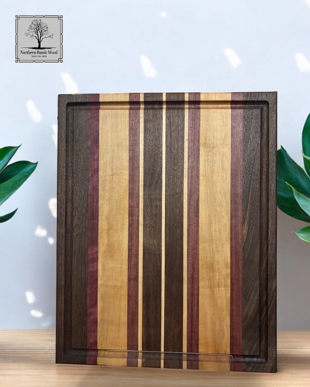 Handmade purpleheart, black walnut and maple cutting board by northern rustic wood