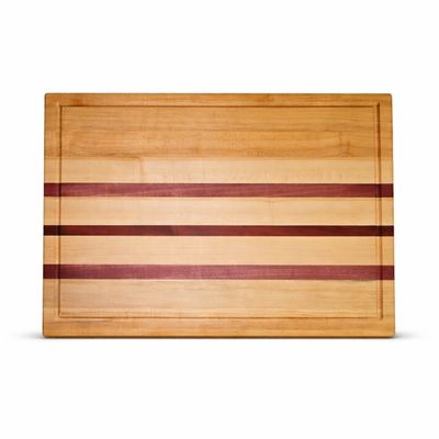 Maple cutting board with offset purpleheart and padauk accent stripes and juice groove
