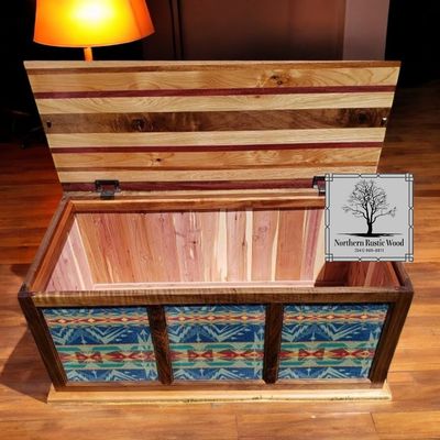 Solid hardwood blanket chest with striped lid and spacious interior by Northern Rustic Wood.