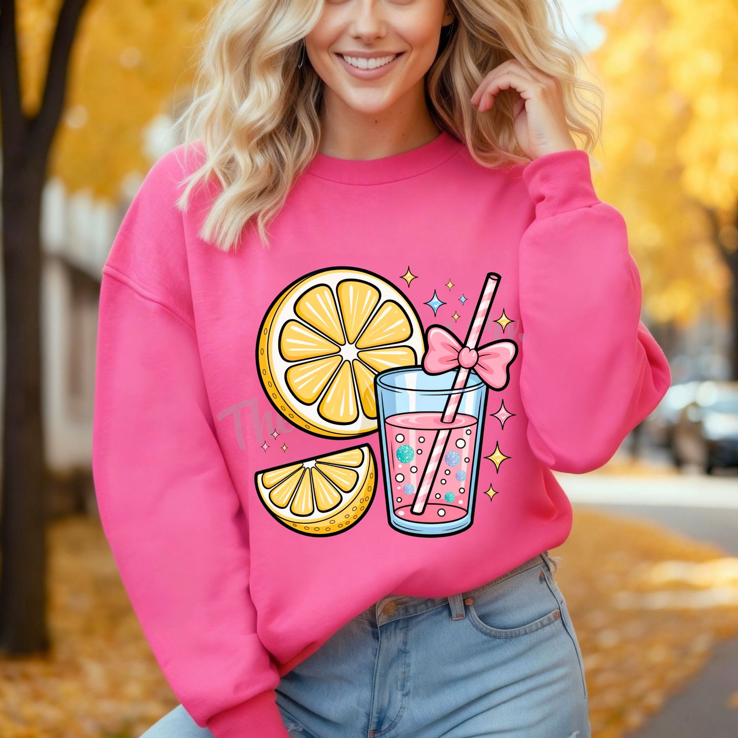 Half lemon with pink lemonade