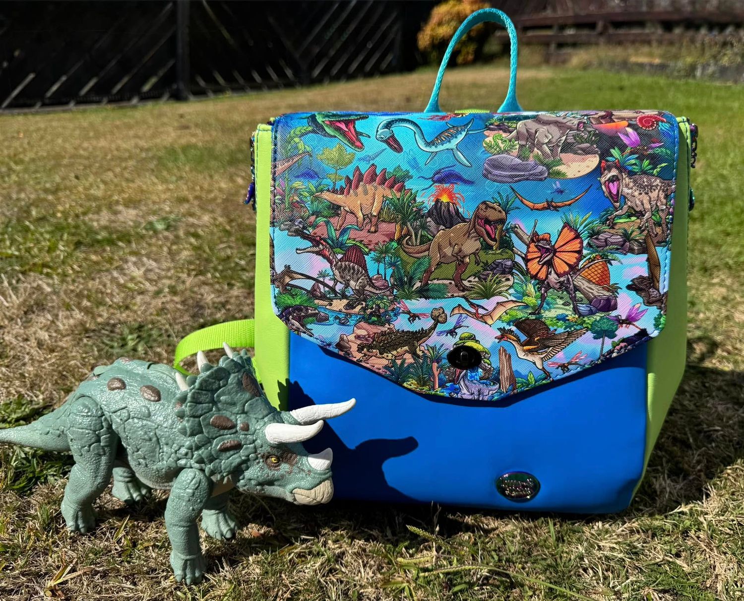 Dinosaur themed sidekick backpack.