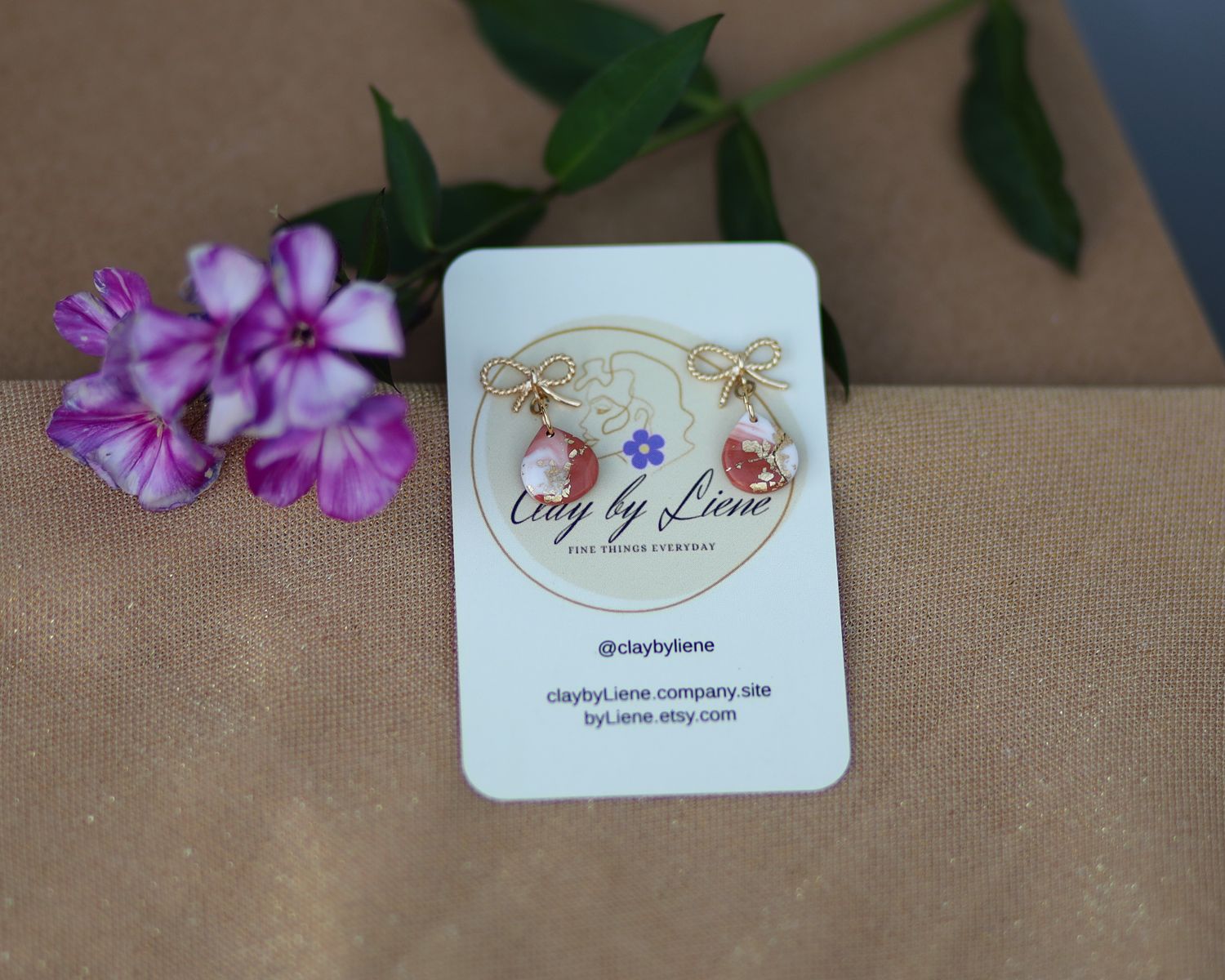 Cozy bow drop earrings