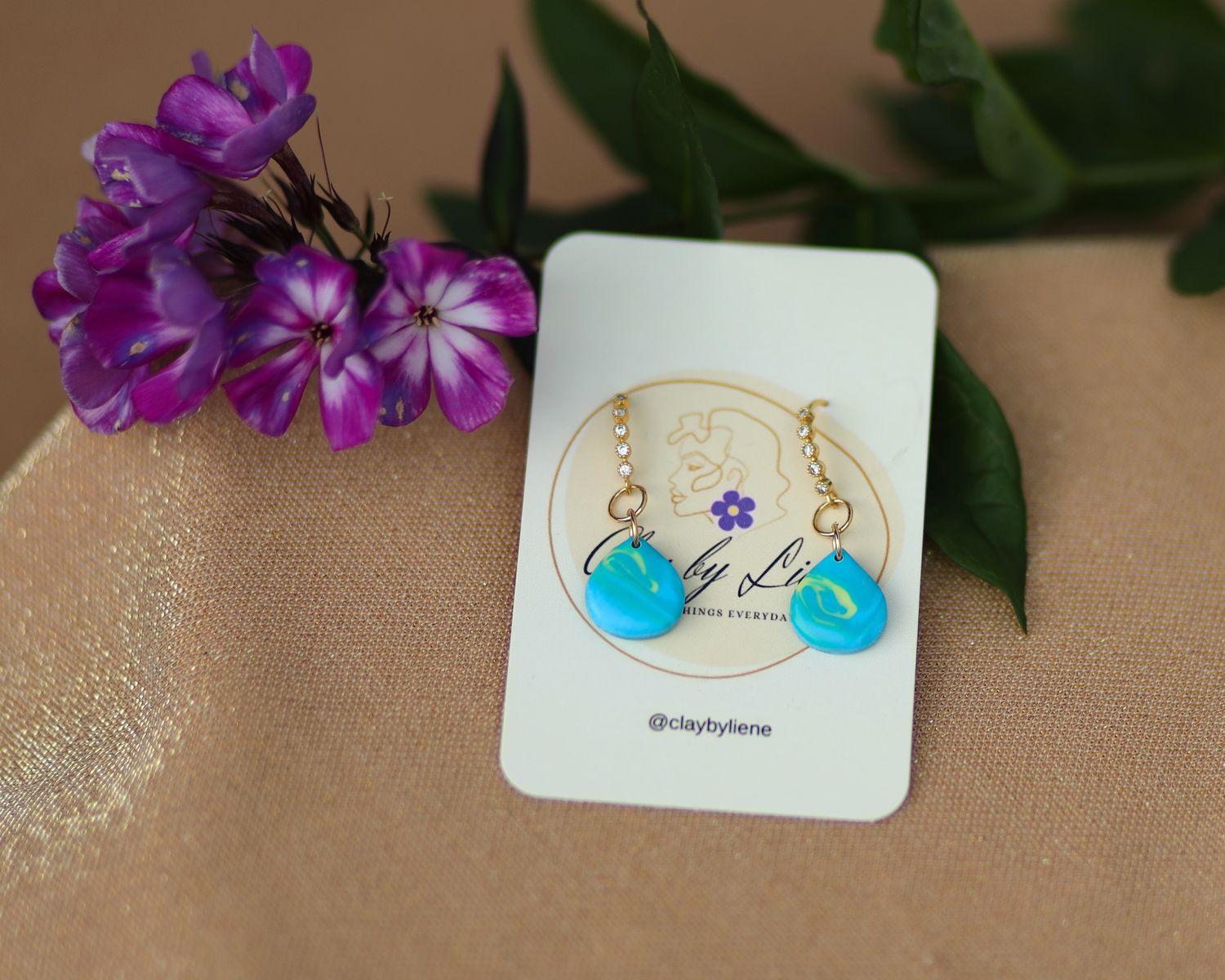 Turquoise drop earrings on hook with zirconia stones