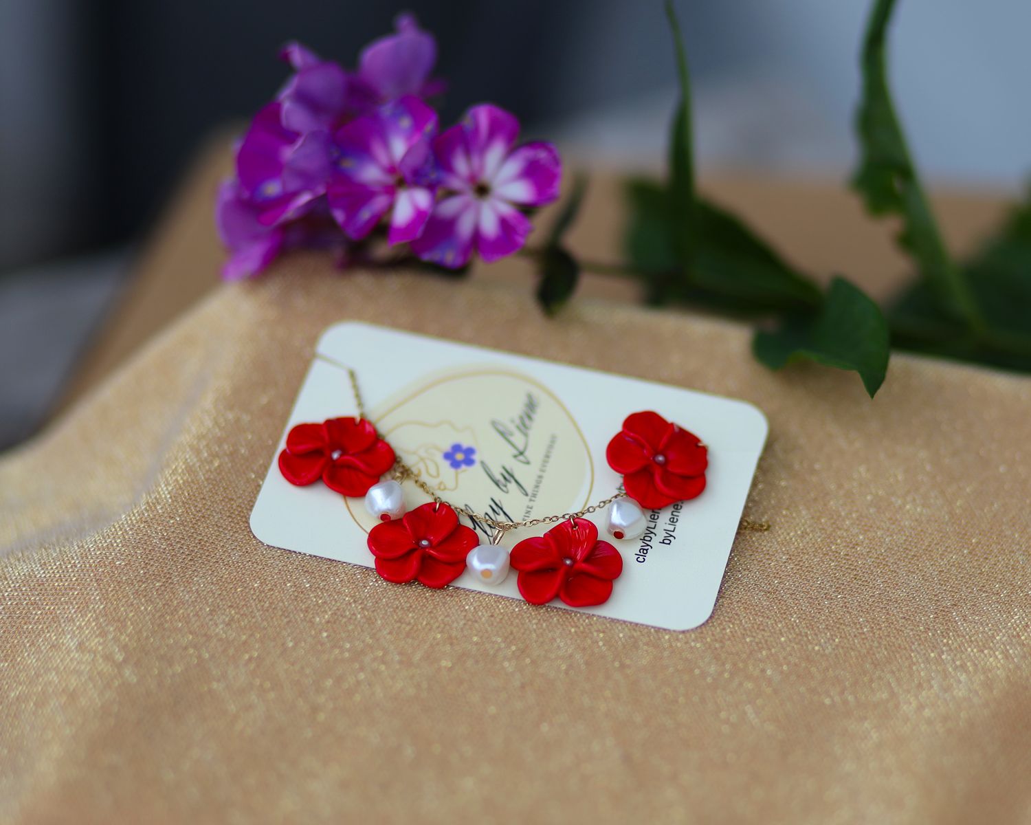Necklace with polymer clay flowers and pearls