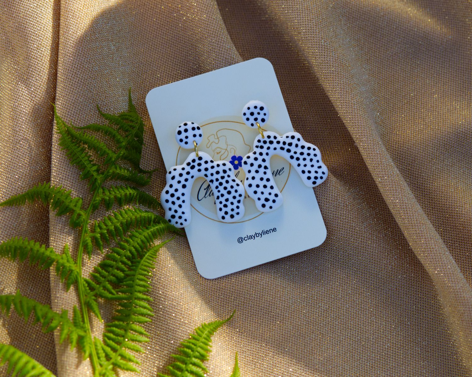 Arch polka dot earrings