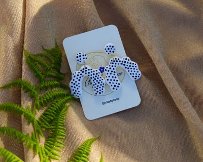 Arch polka dot earrings