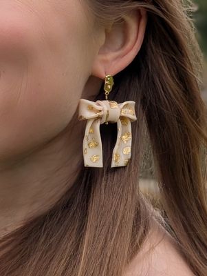 Beige bow earrings with golden dots - large