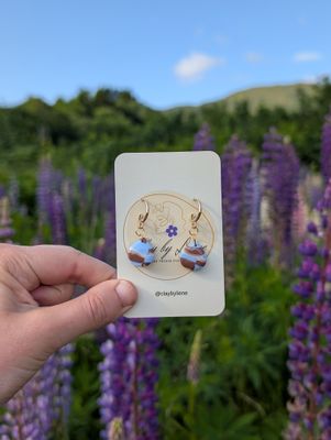 Brown and light blue drop earrings