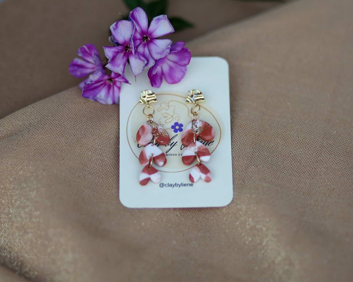 Three hearts dangle earrings