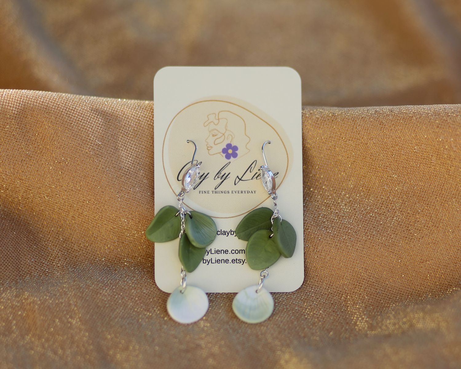 Olive green autumn leaves with zirconia