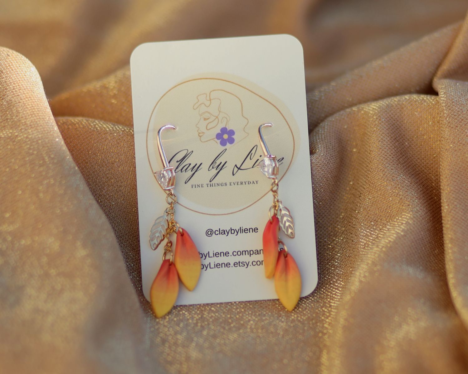 Orange leafy earrings with zirconia