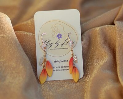 Orange leafy earrings with zirconia