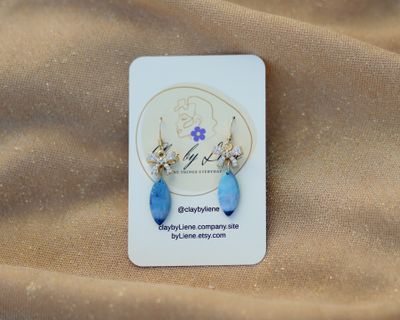 Winter dangle earrings with bow