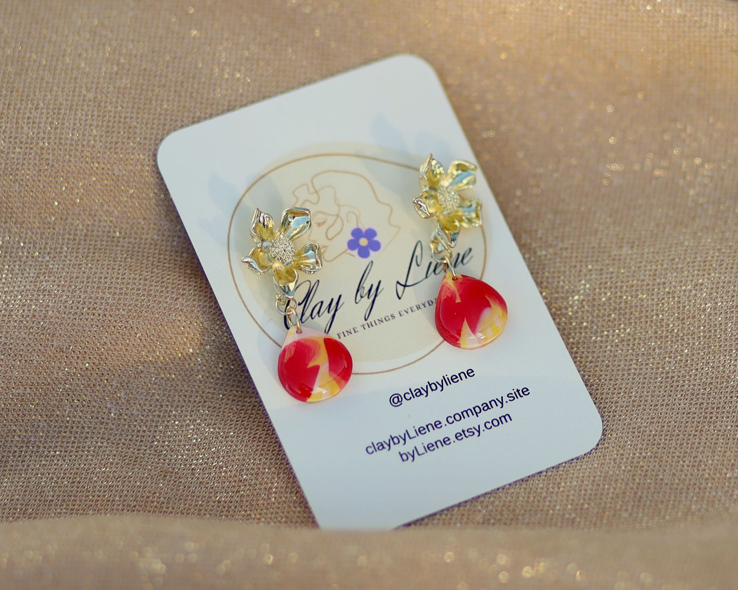 Drop earrings with gold plated flower stud