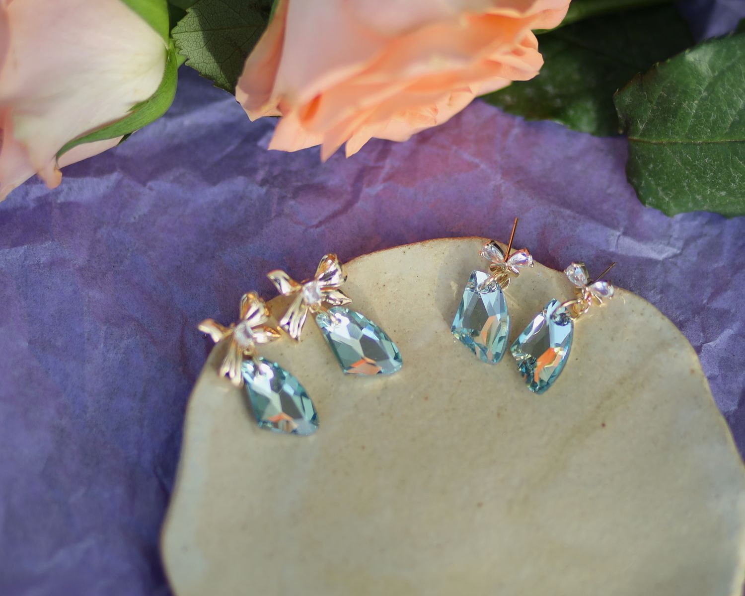 Glass bead earrings with bow stud