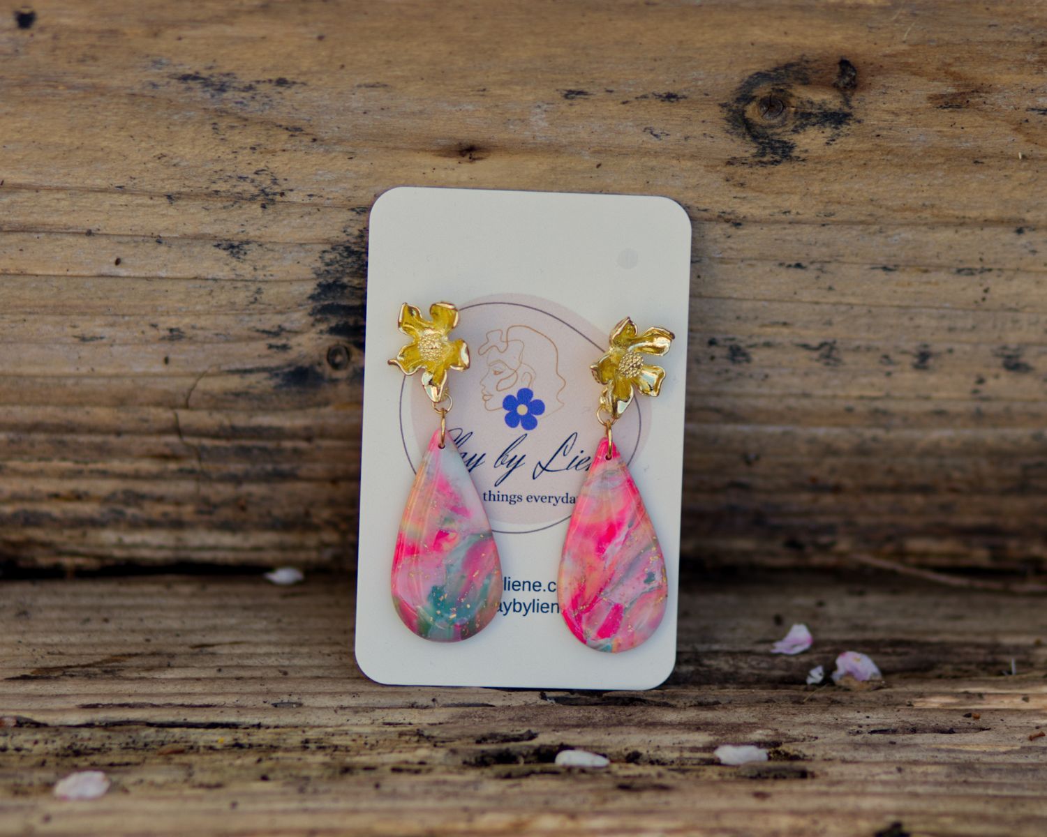 Large drop earrings with flower stud