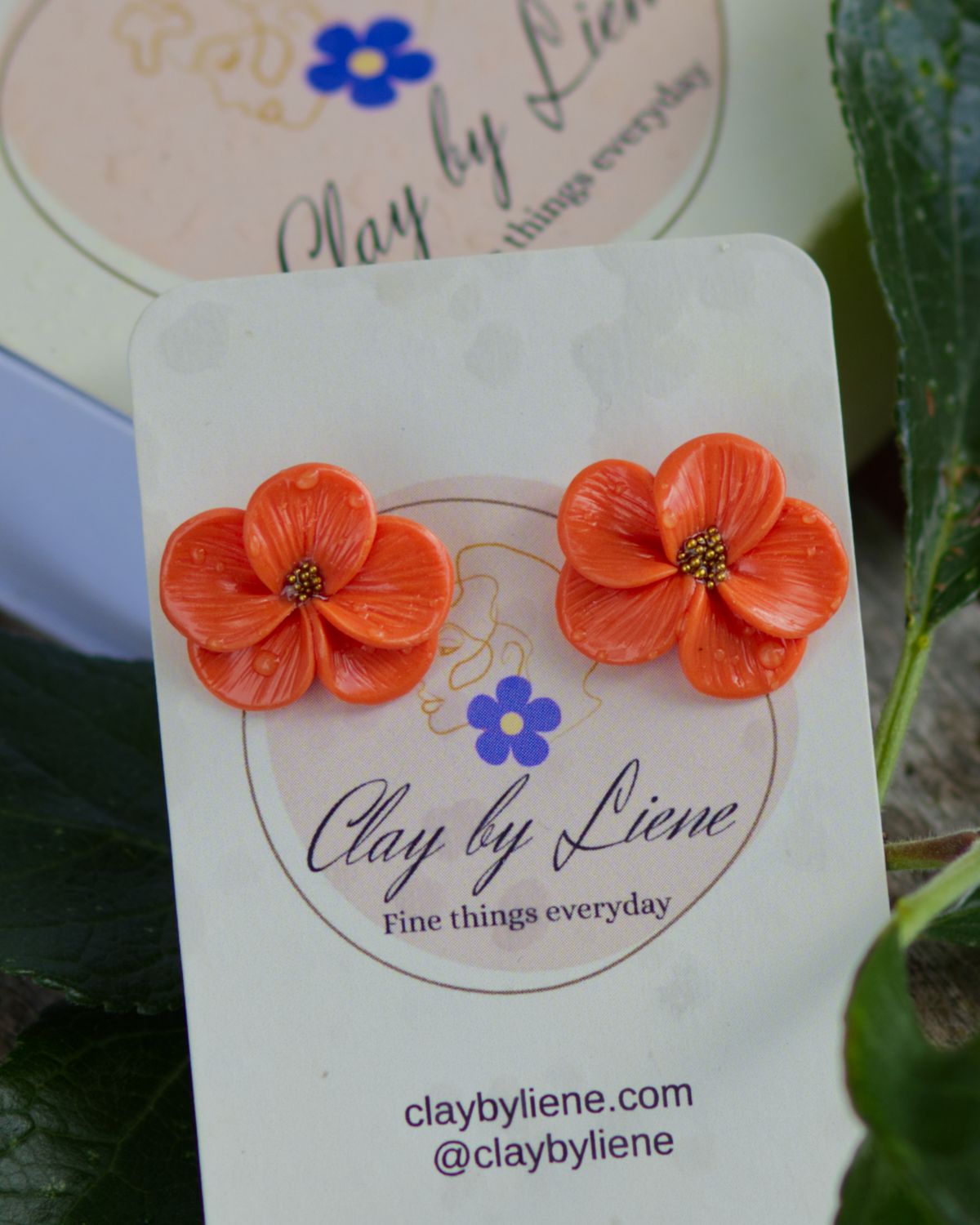 Small orange flower earrings