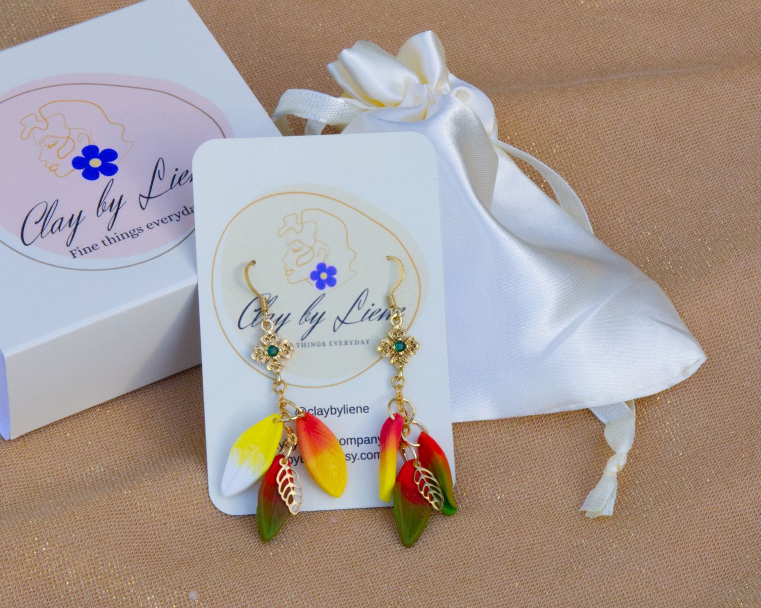 Tripple leaf earrings with green zirconia