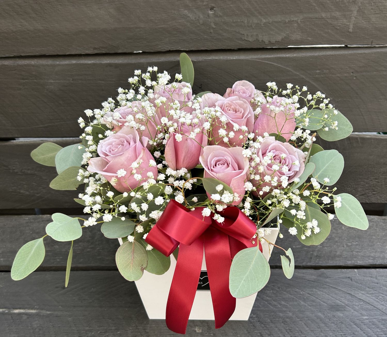 M15 - 9 Lilac Roses in a box