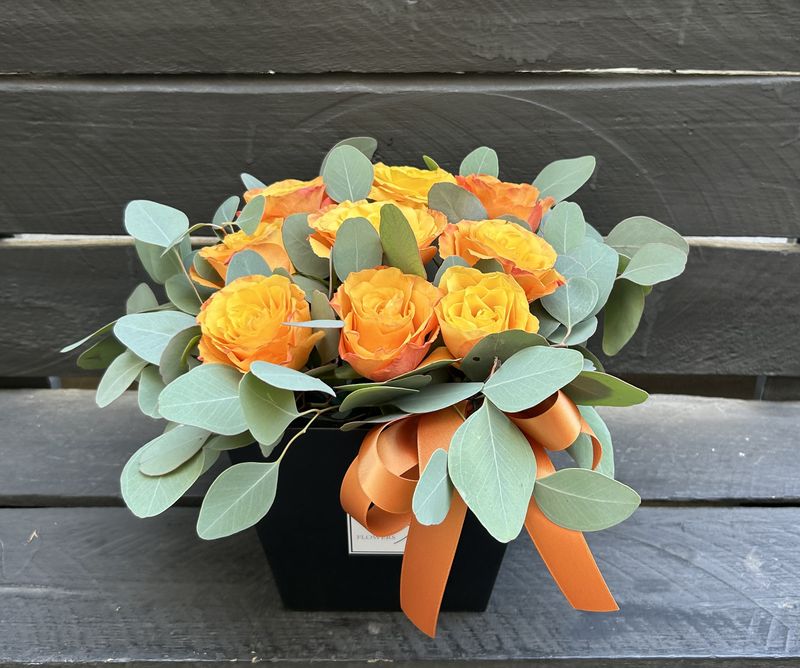 M11 - 9 Orange Roses in a box
