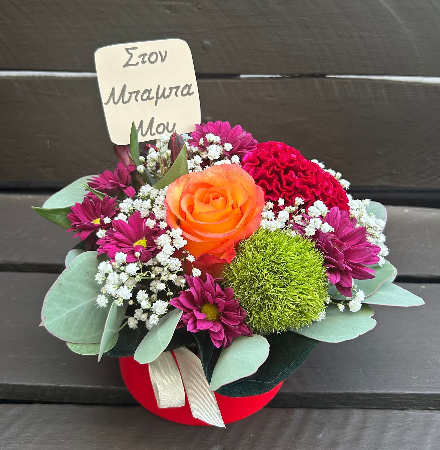 F2605 - Mixed Flowers in a red round box
