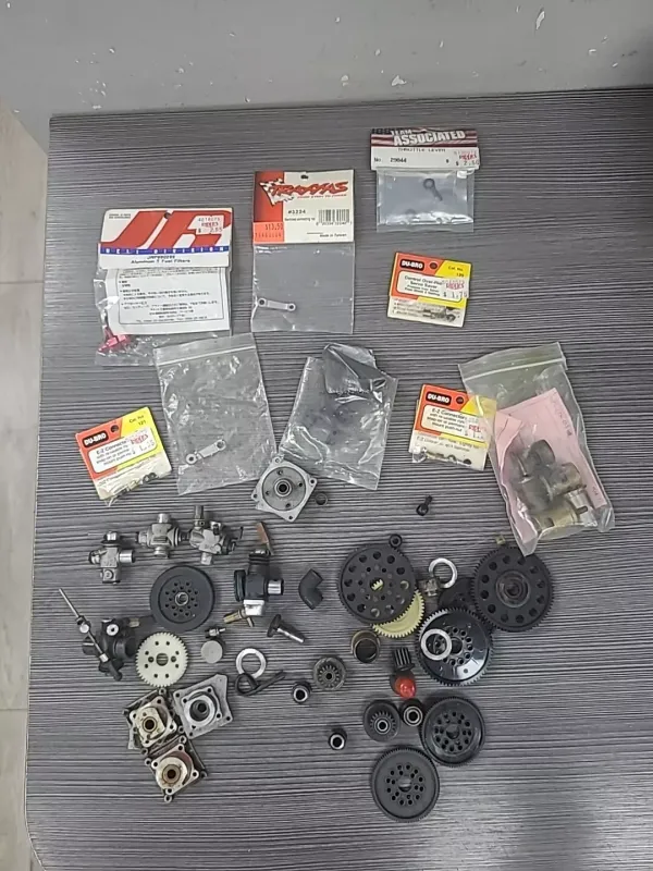 large lot of rc car parts some nip 40+ pc housings throttle lever filters rod