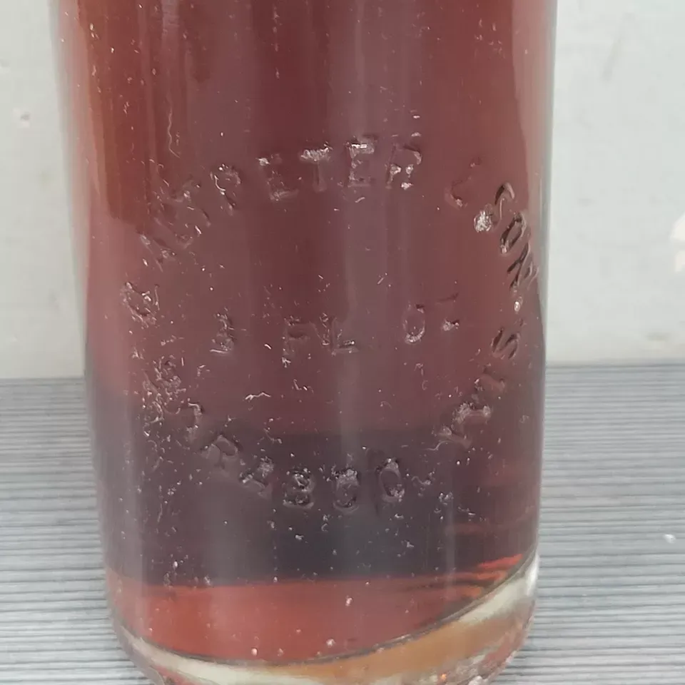 Oscar Altpeter & Sons Baraboo Embossed Glass 8 oz Soda Black cherry Bottle  full