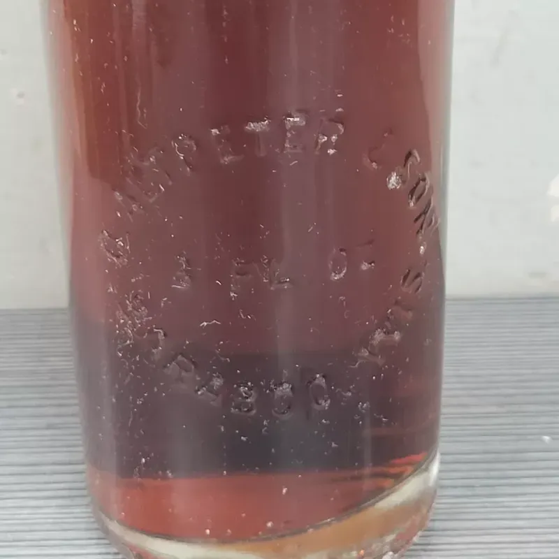 Oscar Altpeter & Sons Baraboo Embossed Glass 8 oz Soda Black cherry Bottle  full
