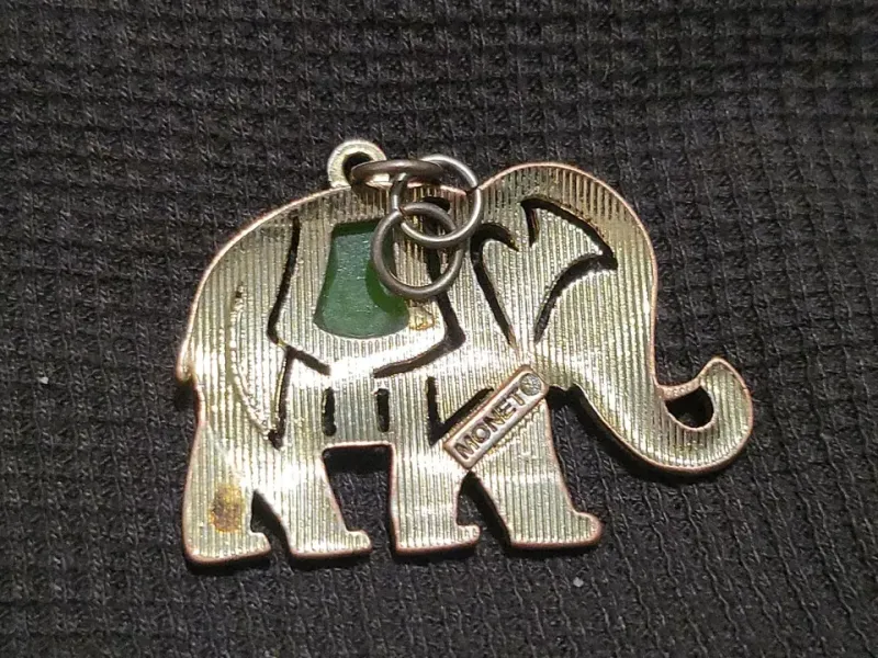 Vintage Monet Elephant pendant w/fiery Rhinestones & Faux Jade Black Glass Eye