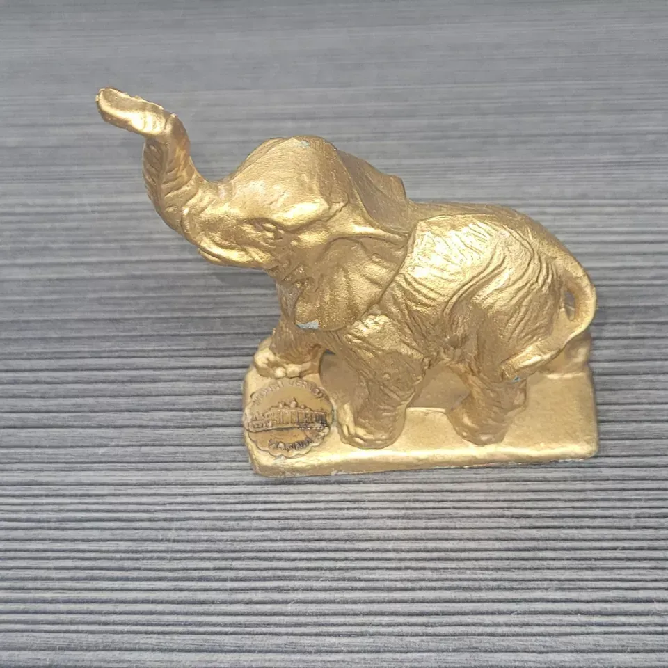 vintage MOUNT VERNON VIRGINIA POT METAL SOUVENIOR ELEPHANT TRUNK UP GOLD FIGURE