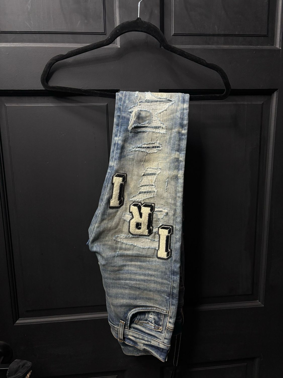 AMIRI JEANS VARSITY