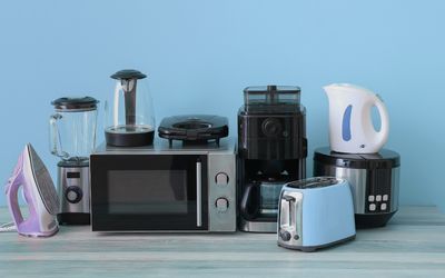 Set of portable electric appliances including mini fridge, fan, and heater