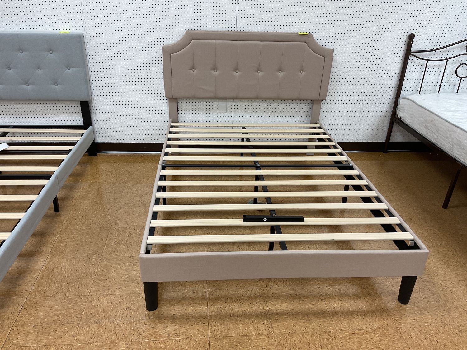 Beige full bed frame