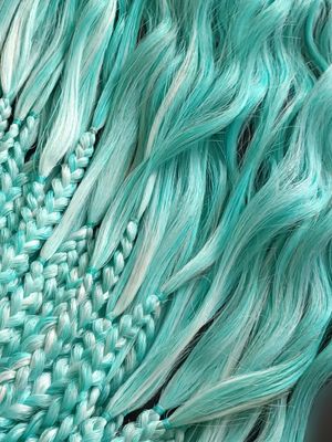 BRAIDS WITH LOOSE, CURLY ENDS
