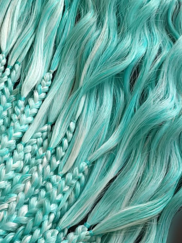 BRAIDS WITH LOOSE, CURLY ENDS