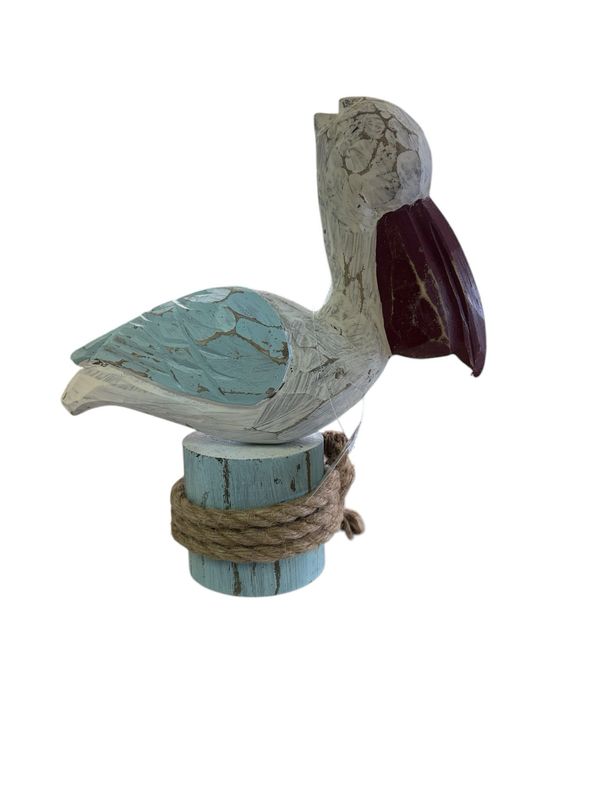 Pelican On A Perch