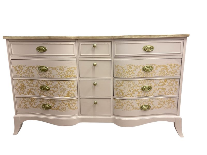 Pink Dresser With Gold Stenciled Drawers