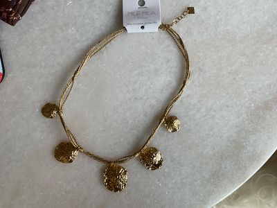 Ketting met gouden rondjes en koord