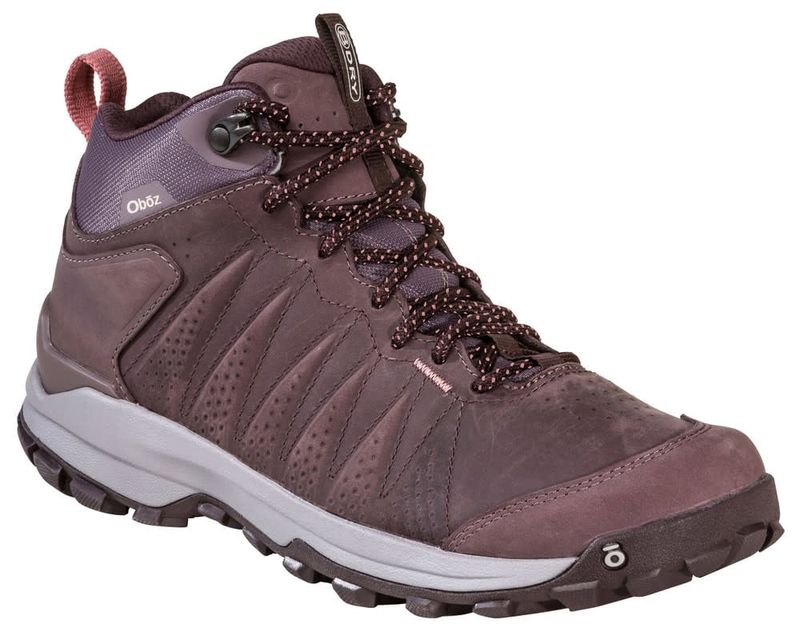 Women&#39;s Oboz Sypes Mid Leather Waterproof hiking shoes with a durable leather upper and deep-lug outsole for grip on mixed terrain.