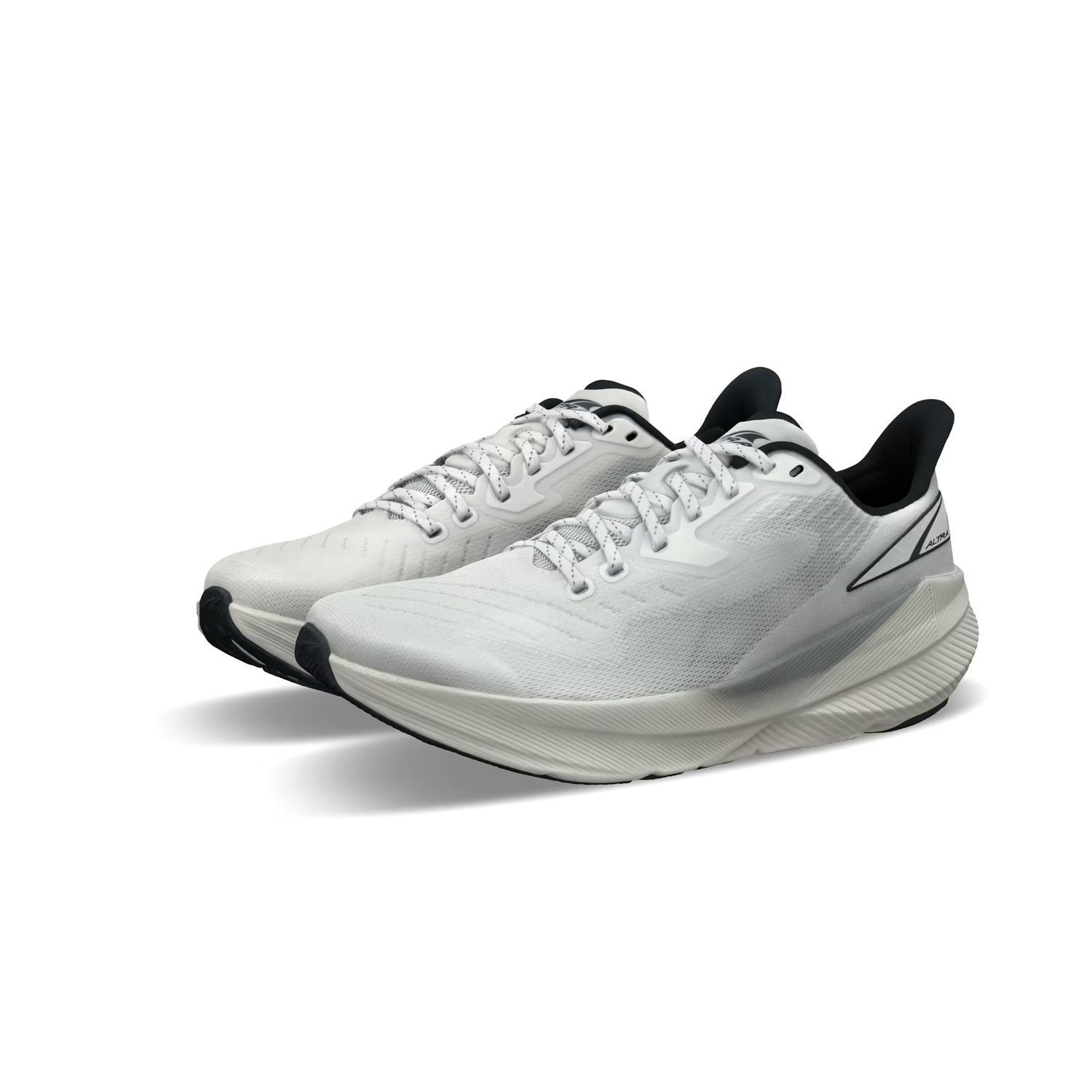 Women&#39;s Altra Experience Flow road running shoes in white and gray breathable mesh with a 4mm drop and FootShape fit, built for smooth, lightweight performance.

