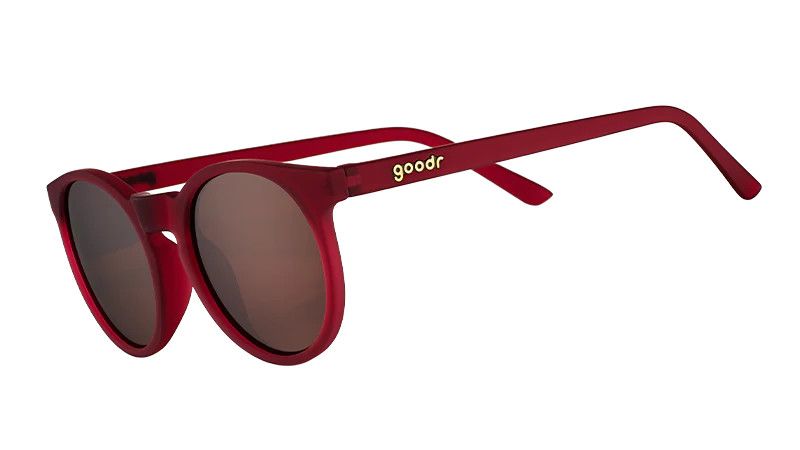 Round burgundy sunglasses with polarized lenses, ideal for small faces and active lifestyles.

