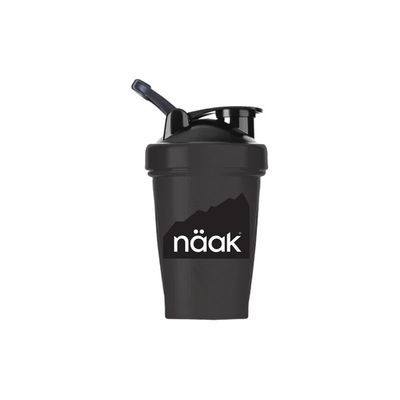 Black see through Näak shaker bottle with 400ml capacity, wire whisk, and twist-top lid for easy mixing of protein or recovery drinks.