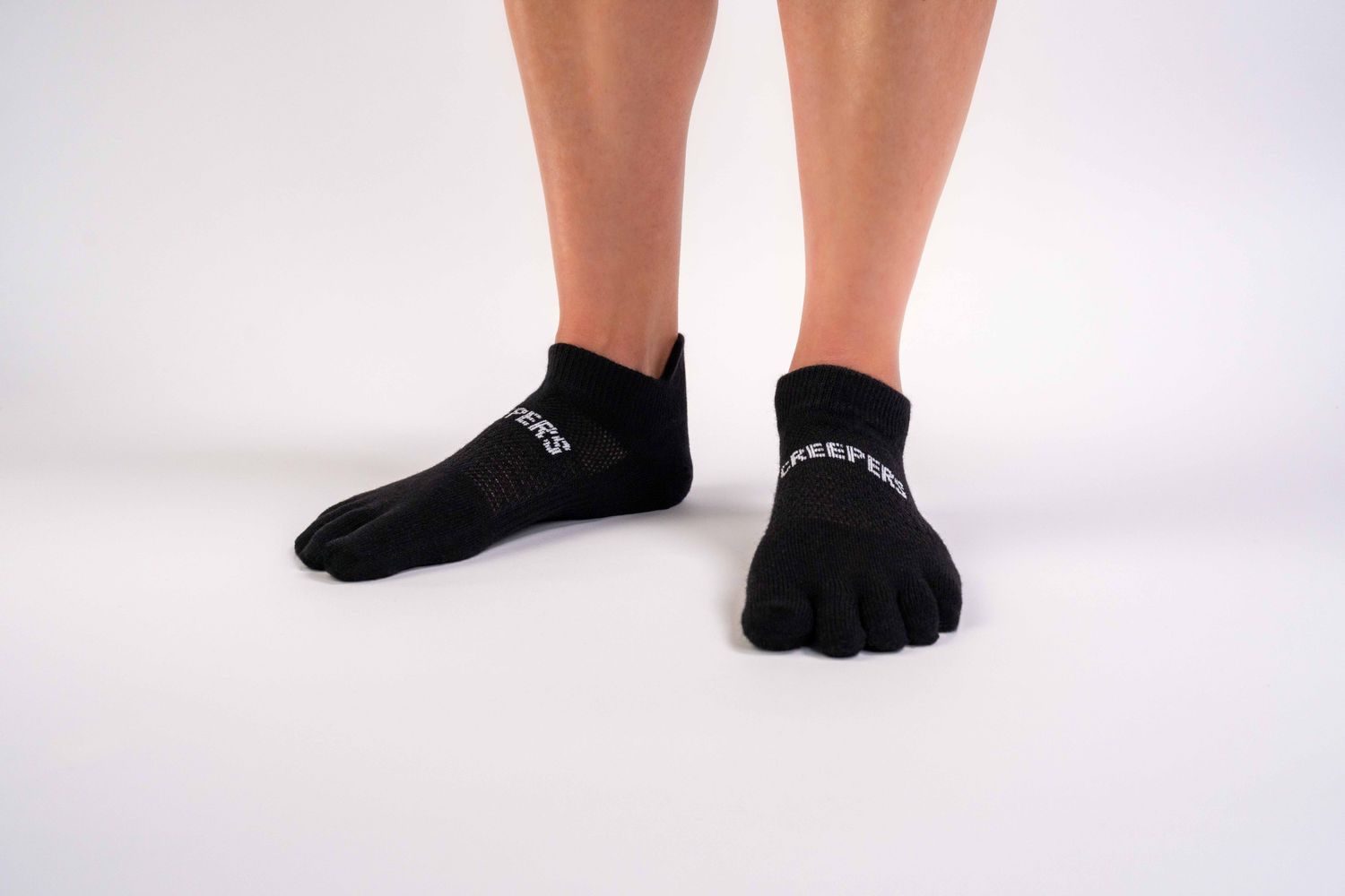 Black merino wool low ankle toe socks with heel tab and anatomical fit