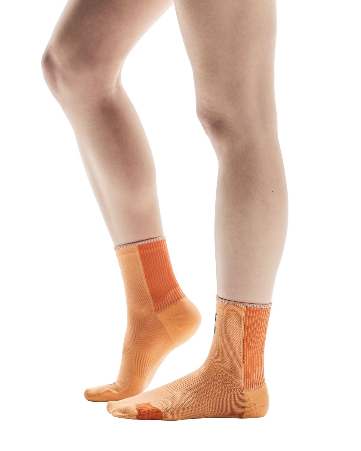 On Performance Run Sock Mid in Tangerine | Flame, breathable, cushioned running socks with arch support and reflective details