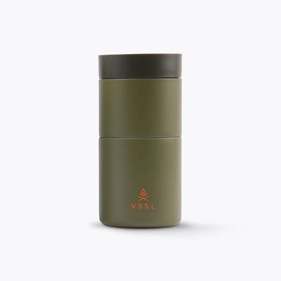 Portable stainless steel pour over coffee set in green moss colour, for outdoor brewing.