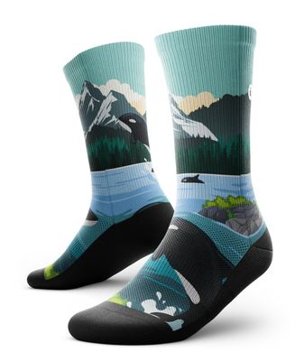 Outway crew-length performance socks featuring orcas, ocean waves, and mountain scenery.