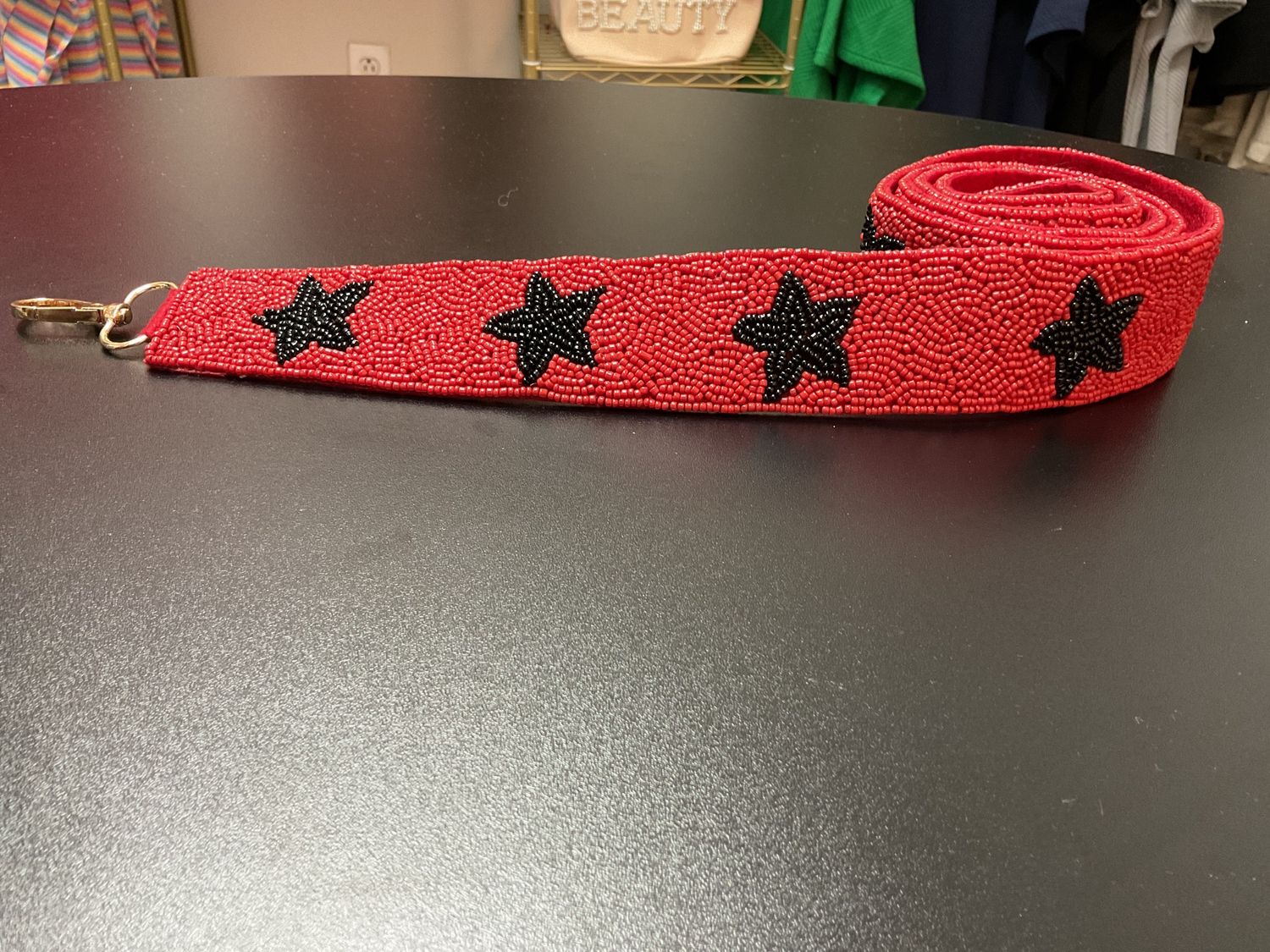 Red and black beaded purse strap